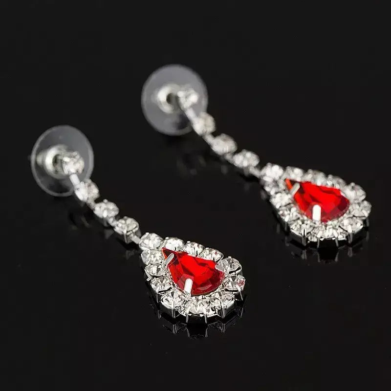 Set collar aretes plateados joyería bodas eventos Colombia